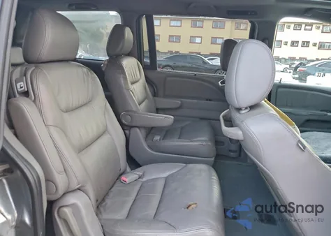 2010 Honda Odyssey Exl z USA, uszkodzony, nr VIN 5FNRL3H73AB025432